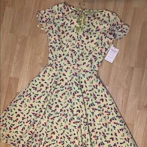 Unique Vintage 1940s Mustard Floral Swing Dress
